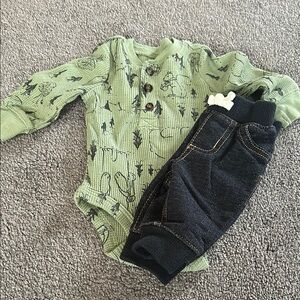 Green Patterned Baby Onesie with Black Pants